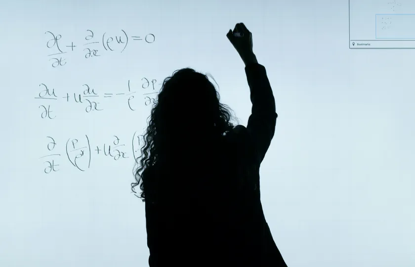 Woman writing on the blackboard - making MathML accessible