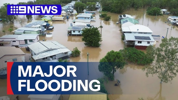 A news graphic showing a massive flood in a typical Australian town.