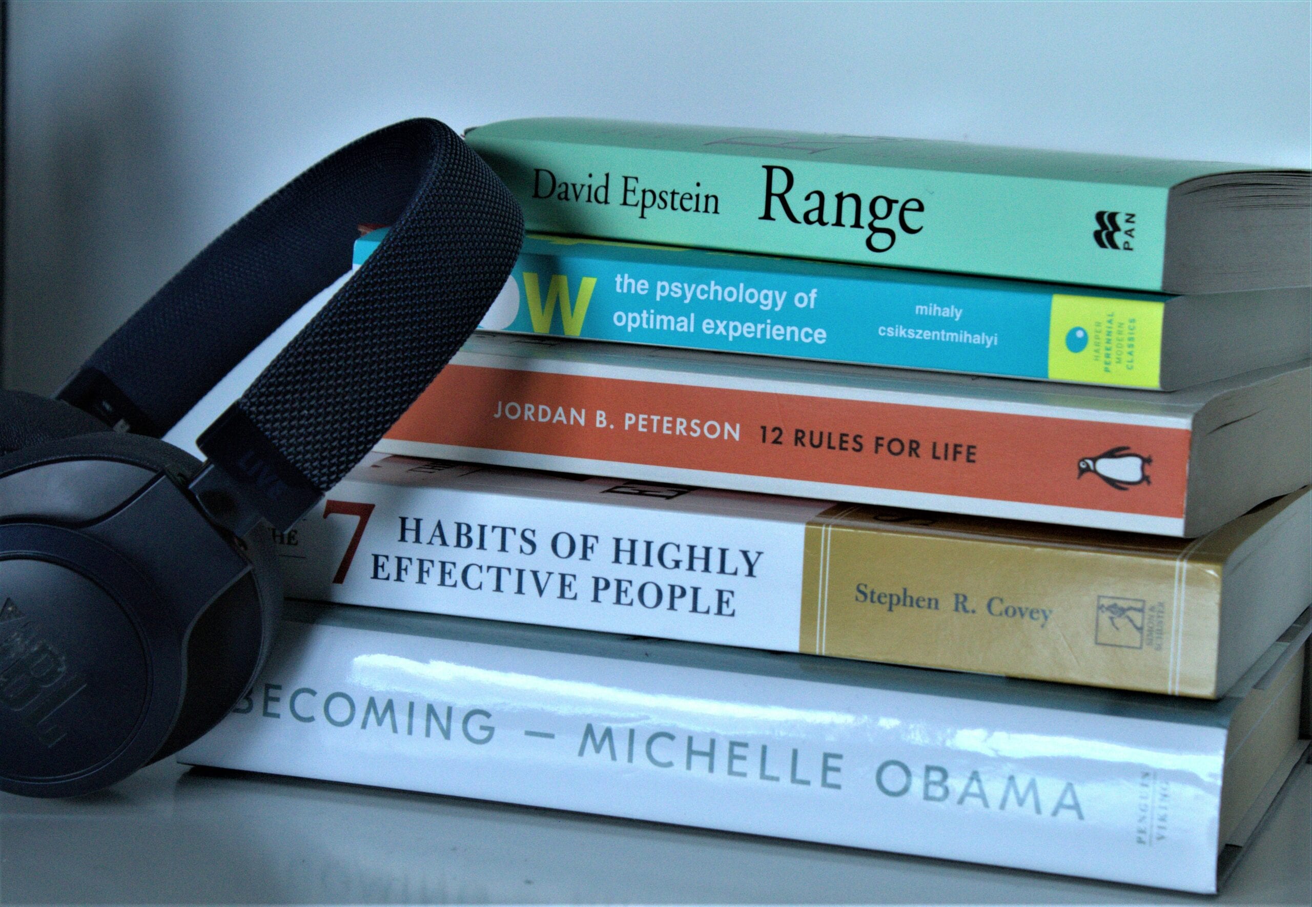 A stack of four books.