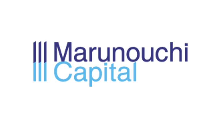 Marunouchi Capital logo with three vertical blue lines followed by the words "Marunouchi" in dark blue and "Capital" in light blue on a white background.