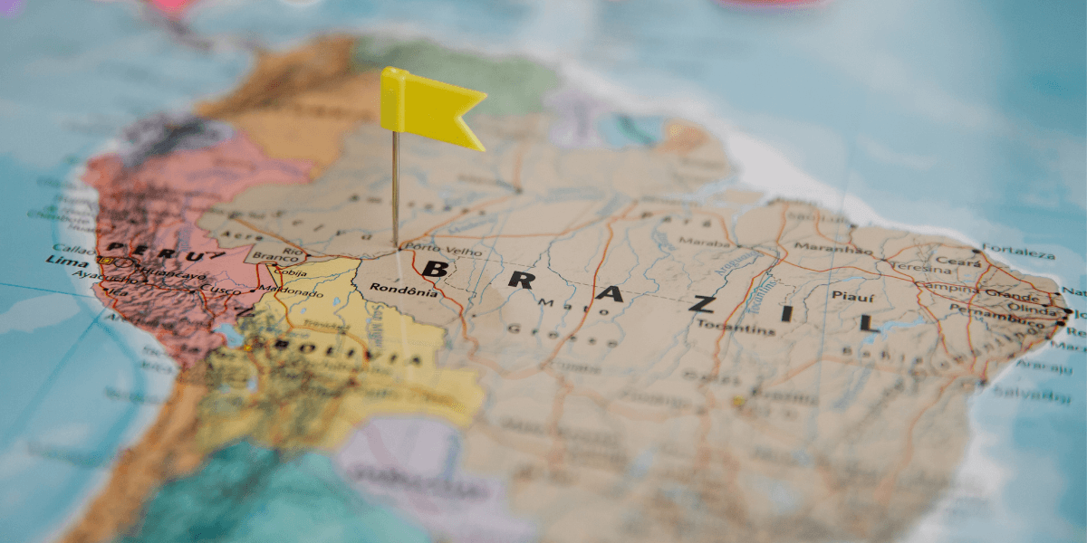 Map of South America with a yellow flag pinned to Brazil.