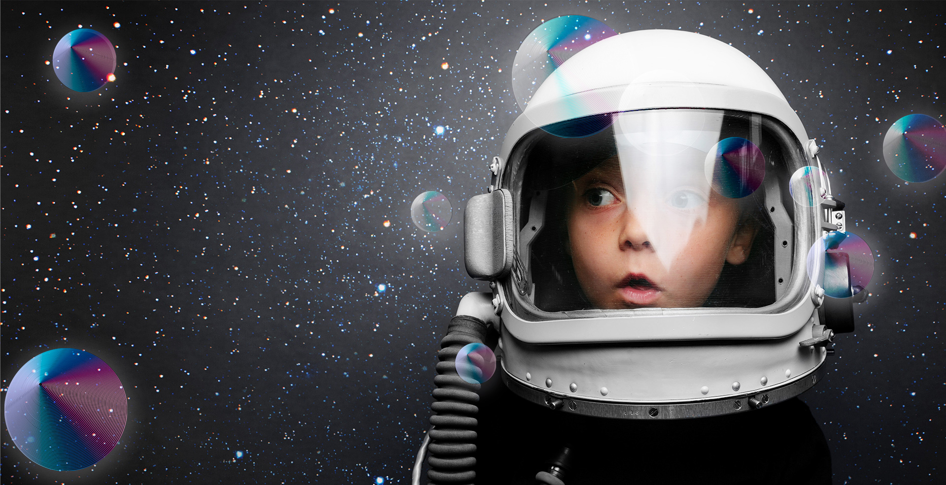 Young boy in space helmet