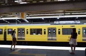A yellow metro stopped at the platform